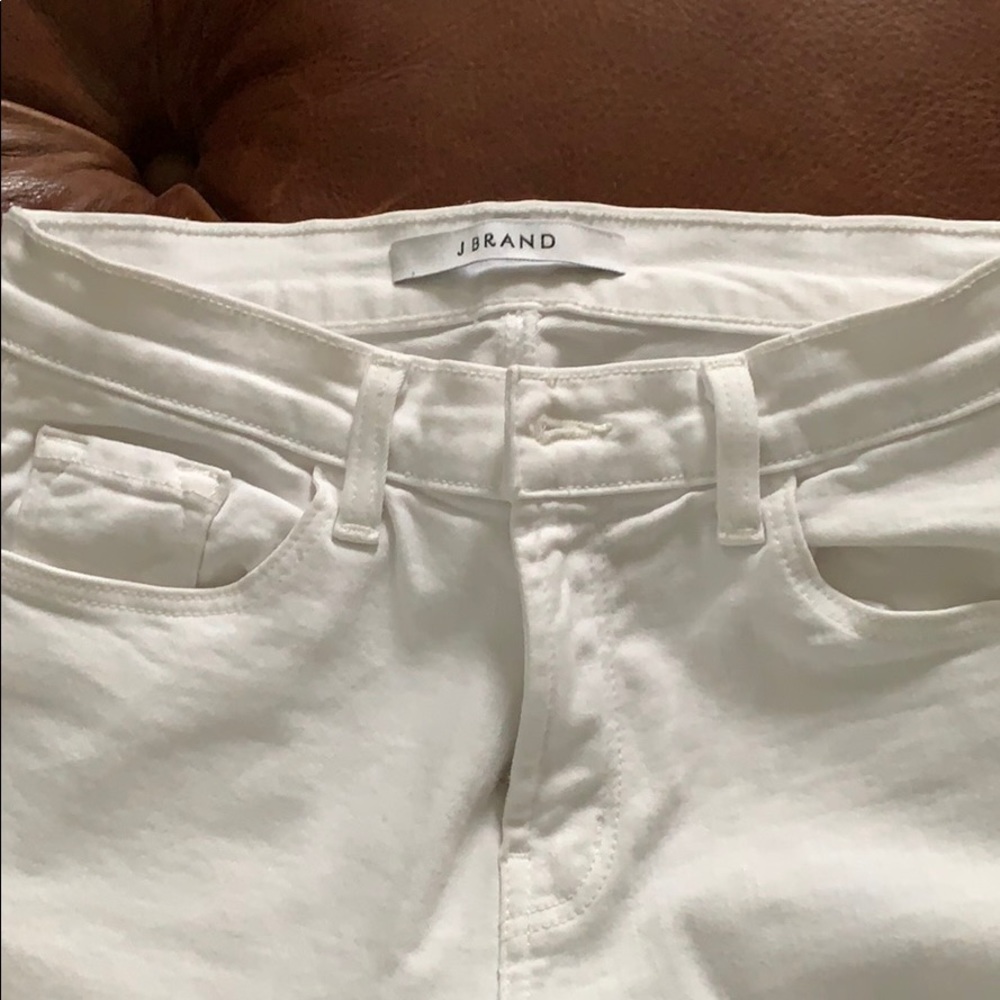 White fringe bell bottom jeans